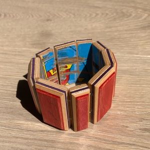 Bracelet made out of old skateboards.